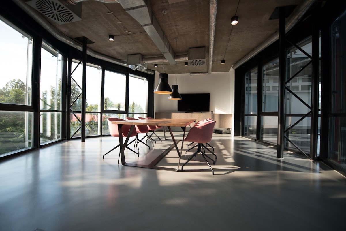 Modern office interior with lake and mountain view